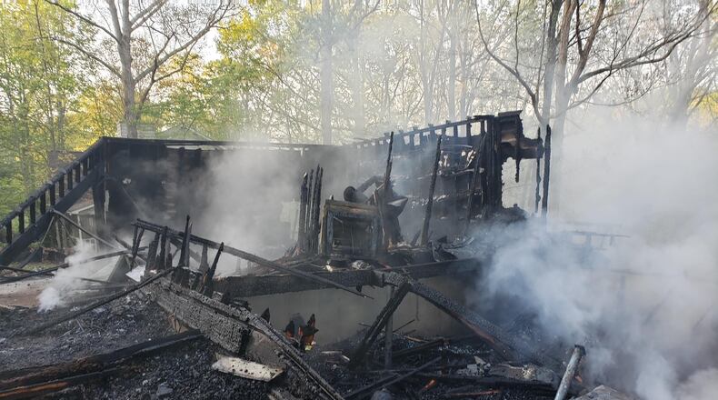 The scene of a Douglasville house fire that resulted in the death of a 46-year-old man. Fire officials said the house was so badly burned, they could not find evidence of a working smoke detector.