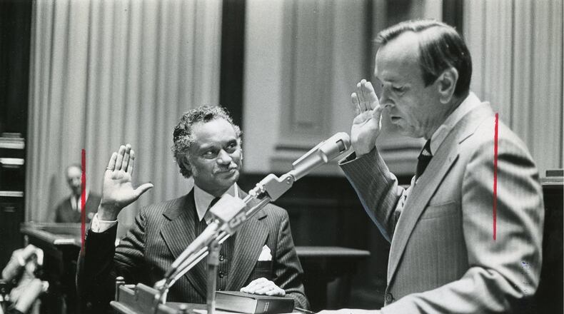 The newspaper caption for this photo read: “Gov. George Busbee swears in Horace Ward. A long route to the Superior Court.” The caption is stamped “Mar 0 6 1977 JNL.-CONSTI.” The print verso is date-stamped “Thu Nov 2 1979,” the probable date of this print. (Atlanta Journal-Constitution Photographic Archive)