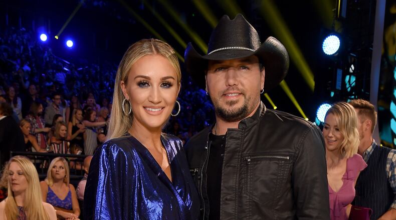 Jason Aldean (R) and Brittany Kerr revealed they are expecting a baby girl. (Photo by Jason Kempin/Getty Images for CMT)