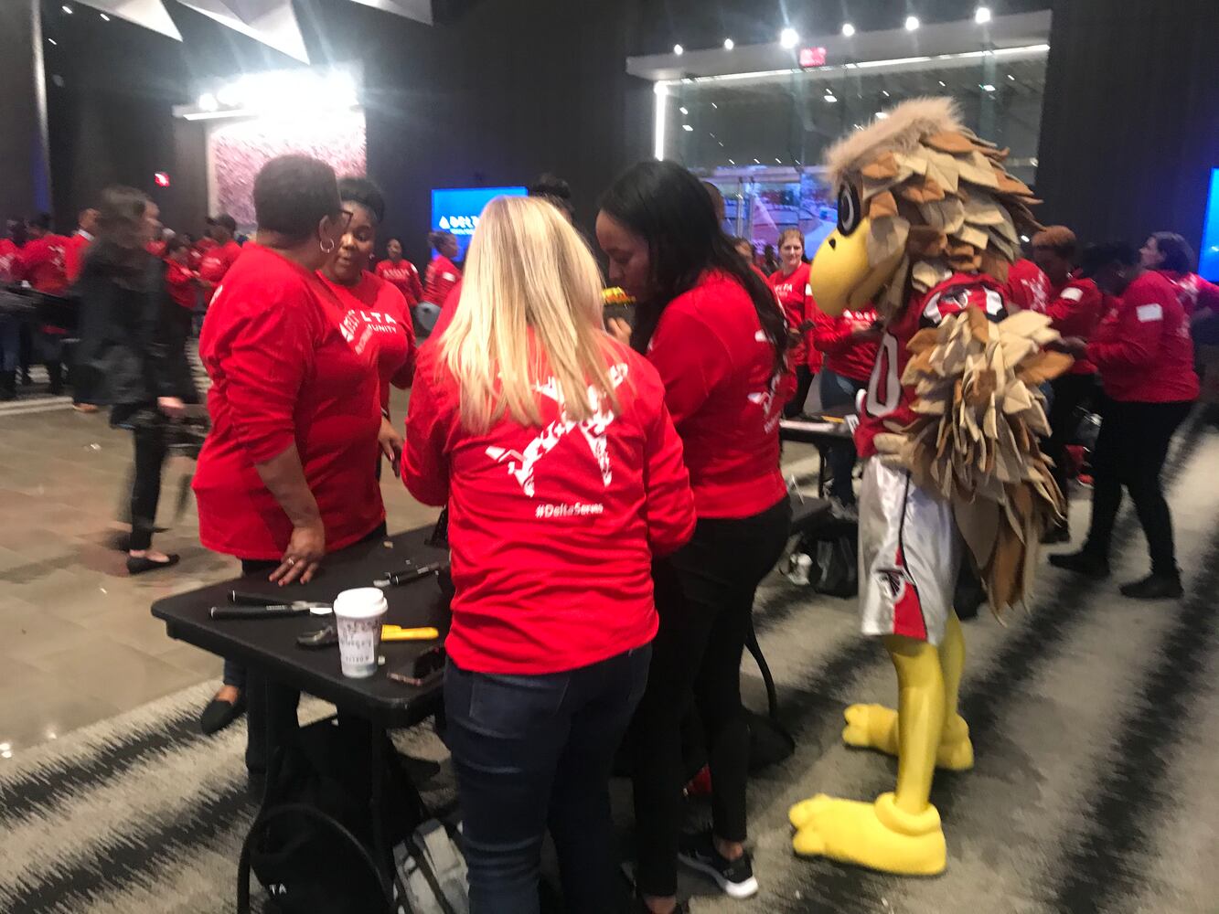 Delta volunteers assemble 100 bicycles to donate to kids