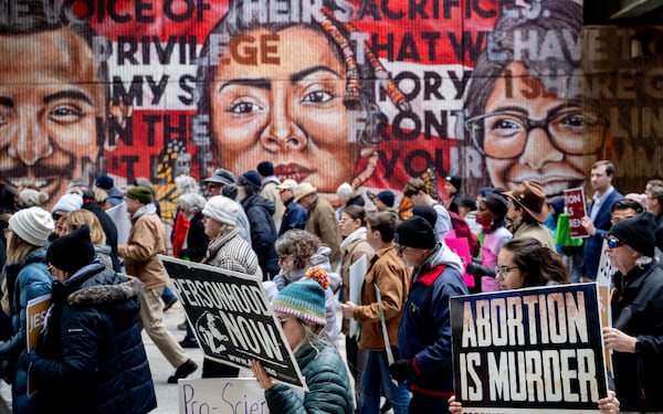 Georgia Right To Life holds a silent march in the streets of downtown Atlanta to commemorate the anniversary of the 1973 Supreme Court ruling in Roe v Wade, Jan. 24, 2025 (Ben Hendren for the AJC)