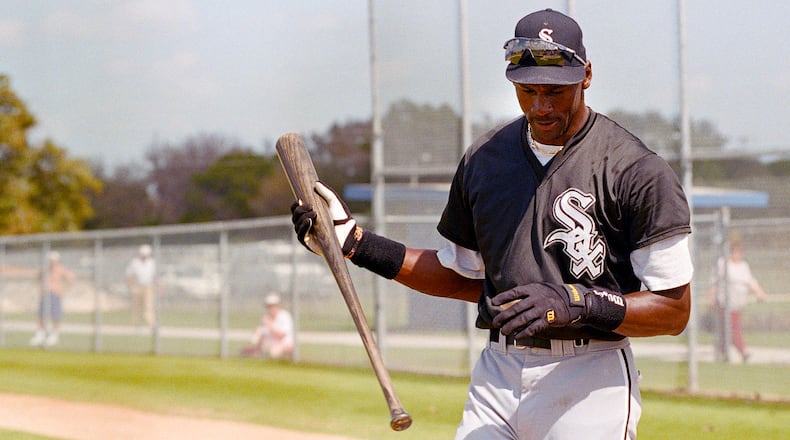 Chicago White Sox minor-leaguer Michael Jordan looks at his hand as he finishes batting practice, Monday, Feb. 27, 1995, Sarasota, Fla. Jordan participated in the White Sox spring training before returning to the NBA.