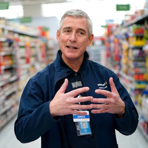 FILE - In this Nov. 9, 2018, file photo, Walmart U.S. President and CEO Greg Foran speaks during an interview at a Walmart Supercenter in Houston. (AP Photo/David J. Phillip, File)
