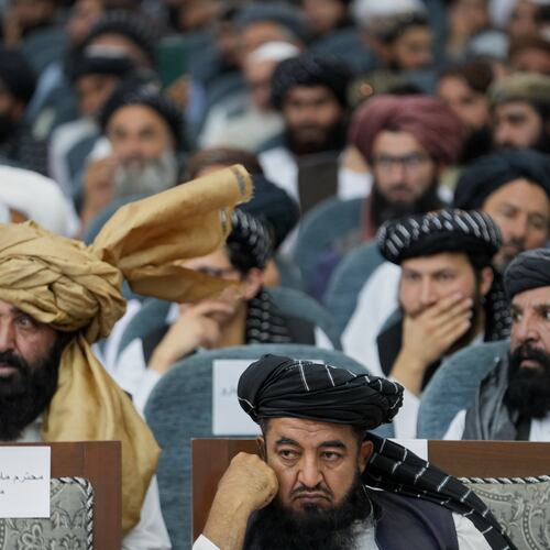 Taliban delegates from across the country attend a meeting that opens celebrations marking the fifth anniversary of the U.S. withdrawal and the start of Taliban rule, at the Loya Jirga Hall in Kabul, Afghanistan, Saturday, Aug. 15, 2026. (AP Photo/Siddiqullah Alizai)