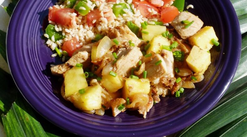 Chicken with rum and pineapple. (Linda Gassenheimer/TNS)
