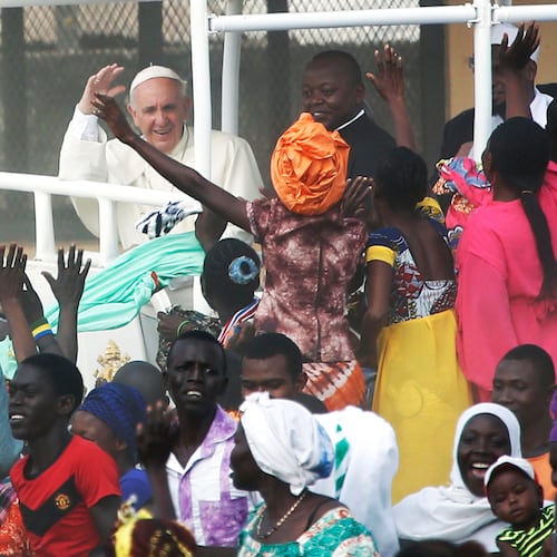 FILE - Pope Francis waves to the crowd on the occasion of his visit at the Central Mosque in Bangui's Muslim enclave of PK5, Central African Republic, on Nov. 30, 2015. (AP Photo/Jerome Delay, File)