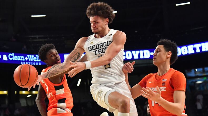Georgia Tech's guard Jordan Usher (4) hangs on the air as he gets off a pass in the second half of a NCAA college basketball game at Georgia Tech's McCamish Pavilion in Atlanta on Saturday, February 27, 2021. Georgia Tech won 84-77 over Syracuse. (Hyosub Shin / Hyosub.Shin@ajc.com)