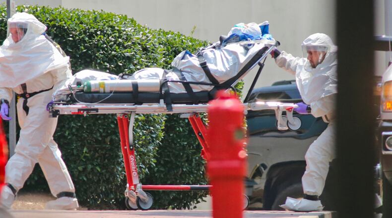 Ebola patient Nancy Writebol is wheeled into Emory University Hospital on Aug. 5.
