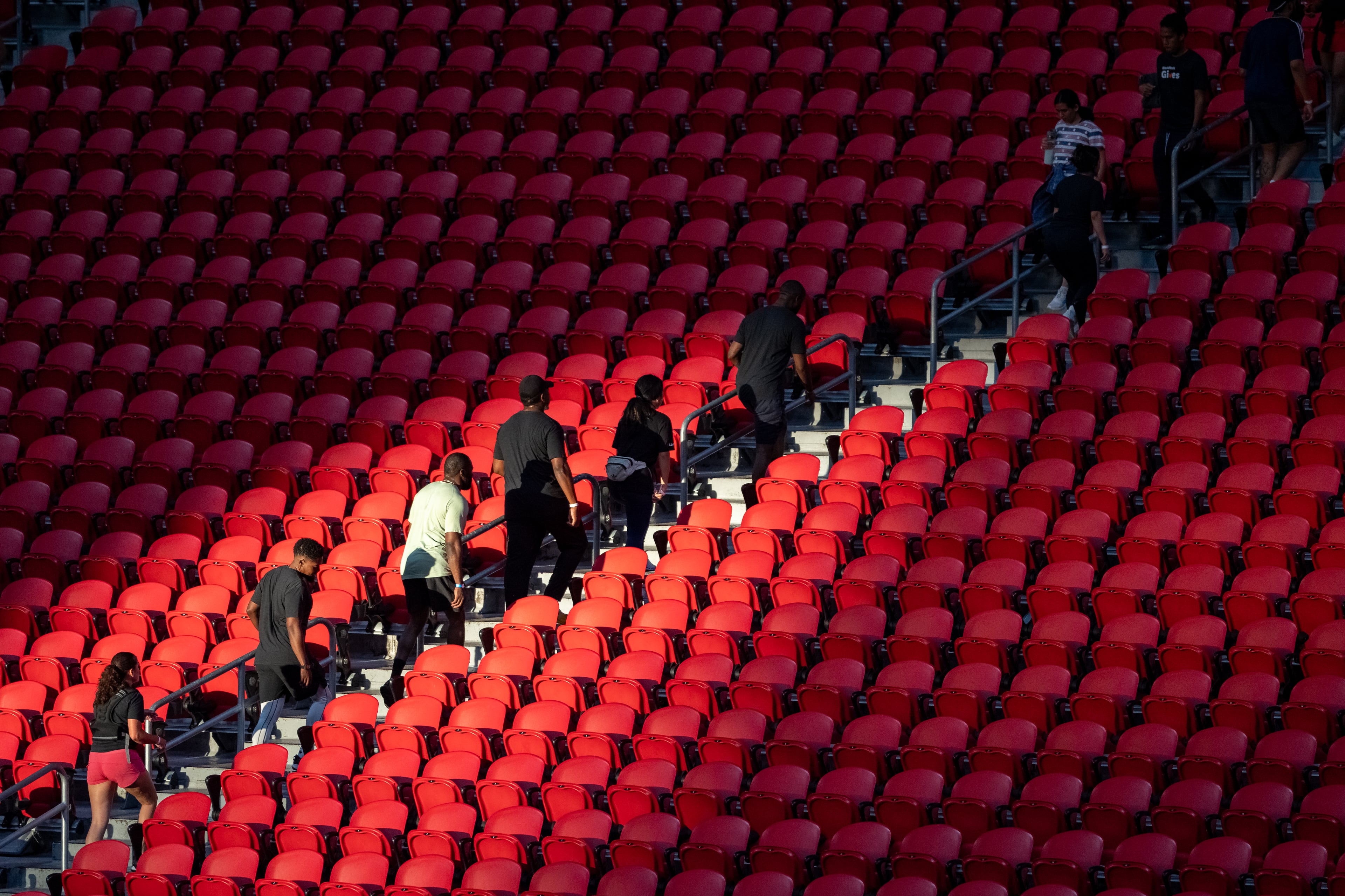 People climb the stands at the 911 Memorial Stair Climb at Mercedes-Benz Stadium on the 24th anniversary of the attacks. Thursday, September 11, 2025 (Ben Hendren for the AJC)
