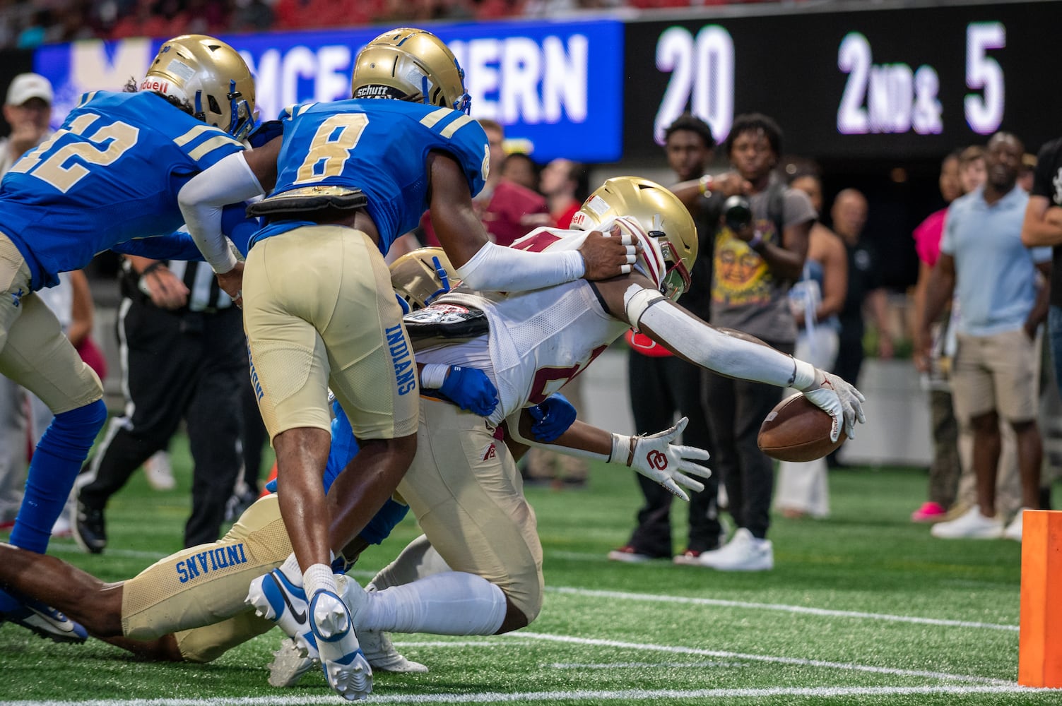 Brayden Tyson, running back for Brookwood, gets past McEachern's defense for a touchdown at Mercedes Benz Stadium on August 19, 2023. (Jamie Spaar for the Atlanta Journal Constitution)