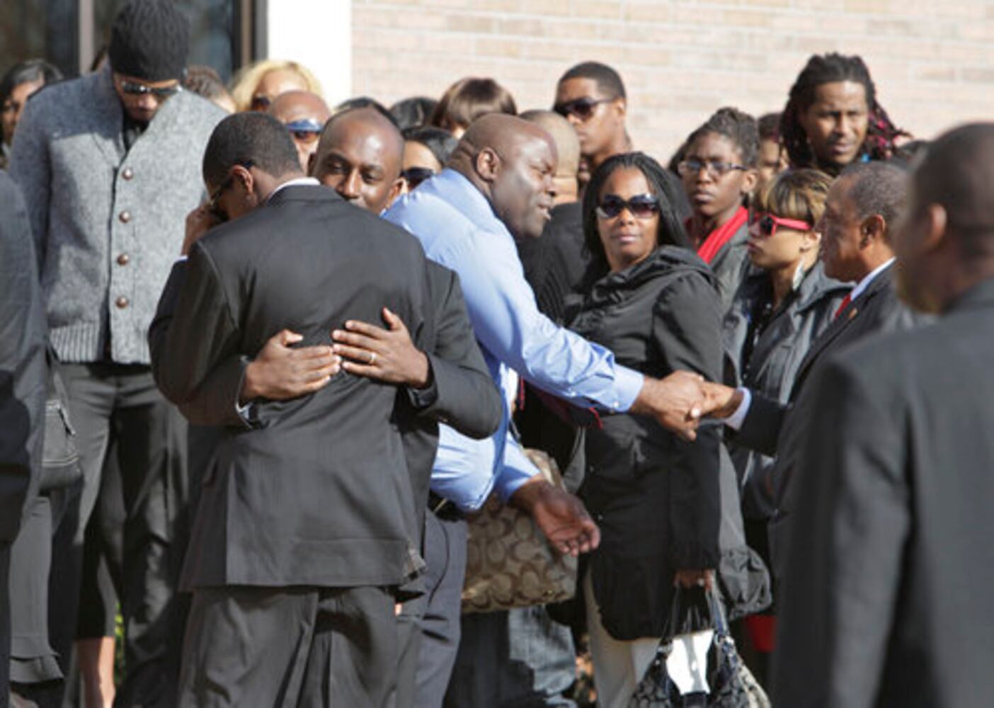 Mourners gather at funeral for Slim Dunkin