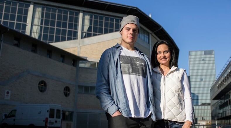 Auston Matthews with his mother, Ema, in Zurich, Dec. 2, 2015. A top National Hockey League draft pick in waiting, the 18-year-old prodigy from Arizona chose to spend a year competing professionally in Switzerland instead of playing college hockey or joining a junior team. (Pascal Mora/The New York Times)