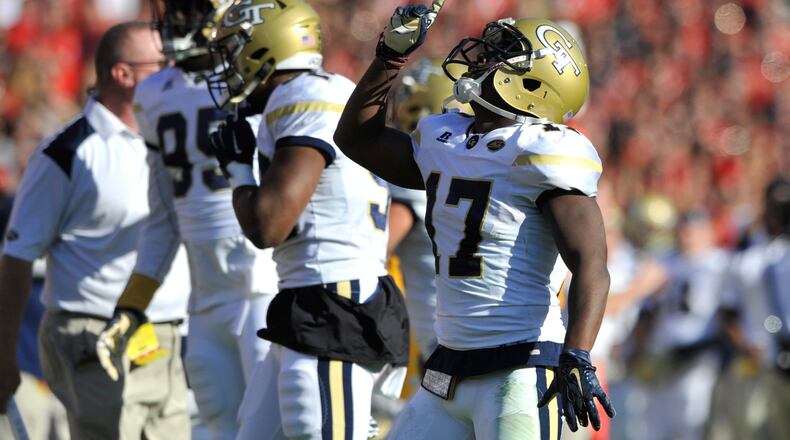 November 26, 2016, Athens - Georgia Tech defensive back Lance Austin (17) celebrates after intercepting the ball during the NCAA college football game between the University of Georgia and Georgia Tech in Athens, Georgia, on Saturday, November 26, 2016. (DAVID BARNES / DAVID.BARNES@AJC.COM)
