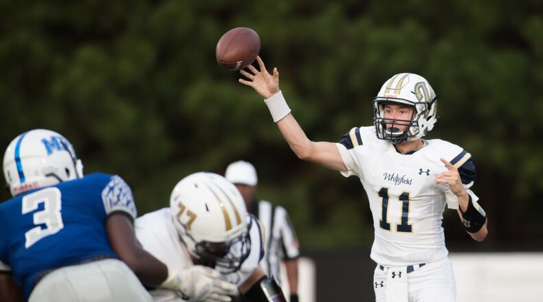 Whitefield Academy quarterback Carson Brown (11) passes the ball during the first half of a high school football game against Mount Paran Christian, Friday, Aug. 28, 2015, in Kennesaw, Ga. BRANDEN CAMP/SPECIAL