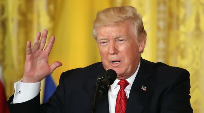 WASHINGTON, DC - MAY 18: U.S. President Donald Trump delivers remarks during a joint news conference with Colombian President Juan Manuel Santos at the White House May 18, 2017 in Washington, DC. The Trump administration has said it wants to slash foreign aide and Santos will most likely seek a renewal of $450 million dollars from the U.S. that supports the peace accord between the Columbian government at the Revolutionary Armed Forces (FARC). (Photo by Mark Wilson/Getty Images)