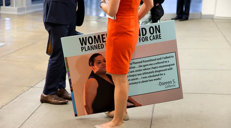 A demonstrator at the Capitol during Senate debate Aug. 3 on defunding Planned Parenthood. (New York Times photo)