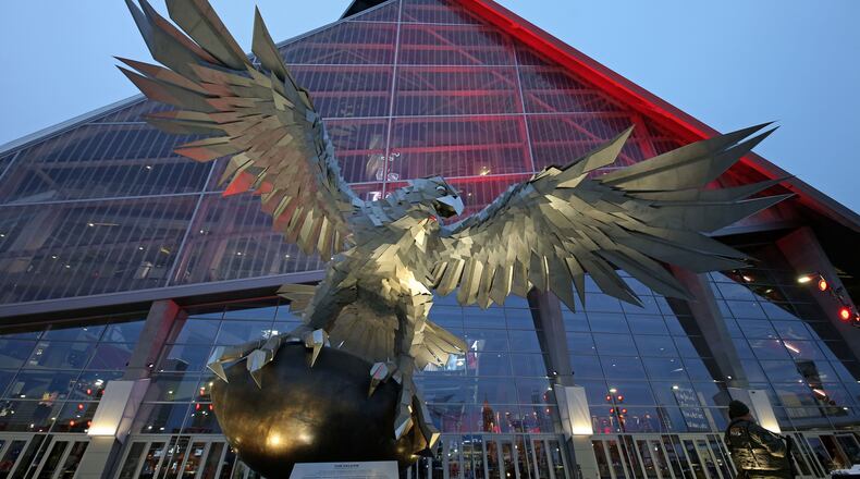 Mercedes-Benz Stadium has a massive falcon scuplture on its “front porch.”