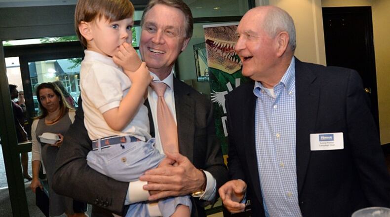 David and Sonny Perdue. AJC file.