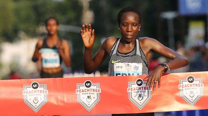 070416 ATLANTA: Edna Kiplagat is the first female finisher in the 47th running of the AJC Peachtree Road Race at Piedmont Park on Monday, July 4, 2016, in Atlanta. Curtis Compton / ccompton@ajc.com