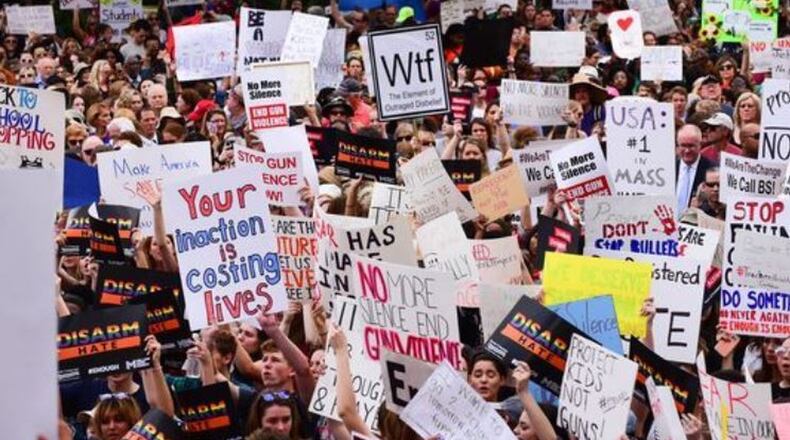Protesters seeking gun-law changes gathered outside the Florida Capitol one week after the shooting at a Parkland, Fla., high school that killed 17 people. (Andrew Salinero/USA Today Network)