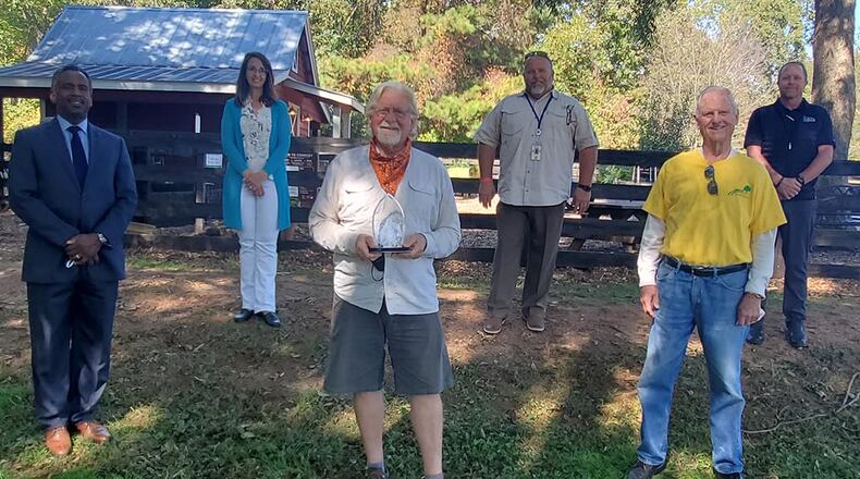 Joining in congratulating Jim Bearden (center) for his state award are (left to right) Cobb Public Services Agency Director William Tanks, Cobb District 1 Commissioner Keli Gambrill, Bearden, Cobb PARKS Director Jimmy Gisi, Bob Hovey with Friends of Green Meadows and Steve Card, executive director of the Georgia Recreation and Parks Association.