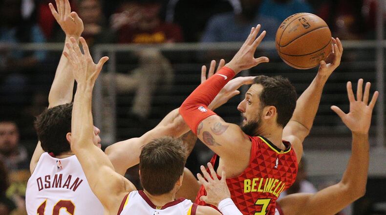 November 30, 2017 Atlanta: Hawks guard Marco Belinelli draws a triple team from the Cavaliers and passes off during the second half in a NBA basketball game on Thursday, November 30, 2017, in Atlanta. Curtis Compton/ccompton@ajc.com