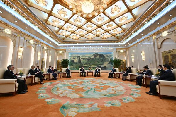 China's Premier Li Qiang, center right, and French Foreign Minister Jean-Noel Barrot, center left, meet at the Great Hall of the People in Beijing Thursday, March 27, 2025. (Adek Berry/Pool Photo via AP)