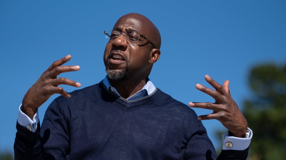 The Rev. Raphael Warnock is attempting to make history by climbing out of Savannah’s Kayton Homes projects to become Georgia’s first Black U.S. senator. Ben Gray for the Atlanta Journal-Constitution
