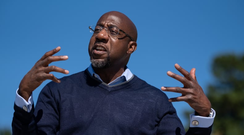The Rev. Raphael Warnock is attempting to make history by climbing out of Savannah’s Kayton Homes projects to become Georgia’s first Black U.S. senator. Ben Gray for the Atlanta Journal-Constitution