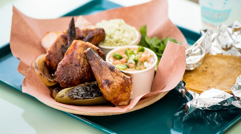 Little Rey serves its Pollo “Al Carbon” family style with tortillas, smoked onions and jalapenos, rancho beans, cilantro rice and a side of chips and salsa. CONTRIBUTED BY MIA YAKEL