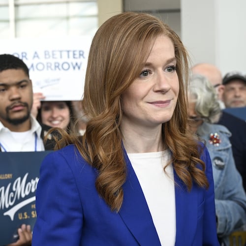 FILE - Michigan State Sen. Mallory McMorrow, D-Royal Oak, a candidate for the U.S. Senate, listens to questions from the media during the Michigan Democratic Party State Endorsement Convention, April 19, 2026, in Detroit. (AP Photo/Jose Juarez, File)