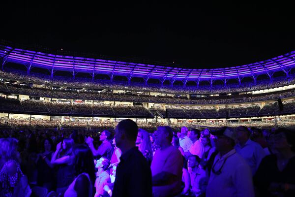  Fans on the field level of SunTrust Park sing along to Billy Joel. Photo: Robb Cohen Photography & Video