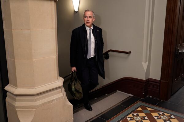 Prime Minister Mark Carney arrives on Parliament Hill to chair a meeting of the Cabinet Committee on Canada-U.S. Relations and National Security, Thursday, March 27, 2025 in Ottawa. (Adrian Wyld /The Canadian Press via AP)
