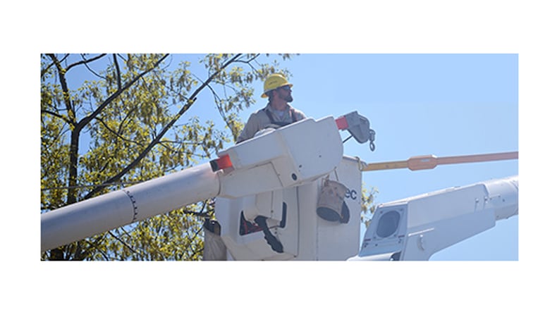 Crews of Sawnee EMC replaced high-pressure sodium street lights with new, energy-efficient LED lighting in parts of Alpharetta served by the utility. (City of Alpharetta)