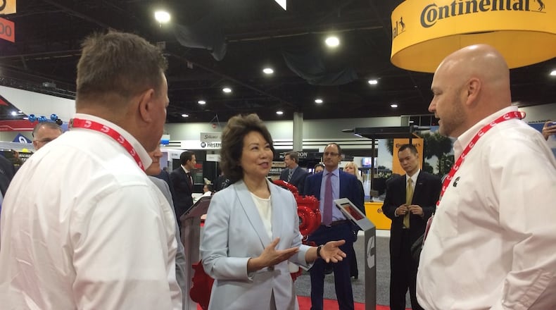 U.S. Transportation Secretary Elain Chao chats with vendors at an American Public Transportation Association conference in Atlanta Wednesday. David Wickert/ dwickert@ajc.com