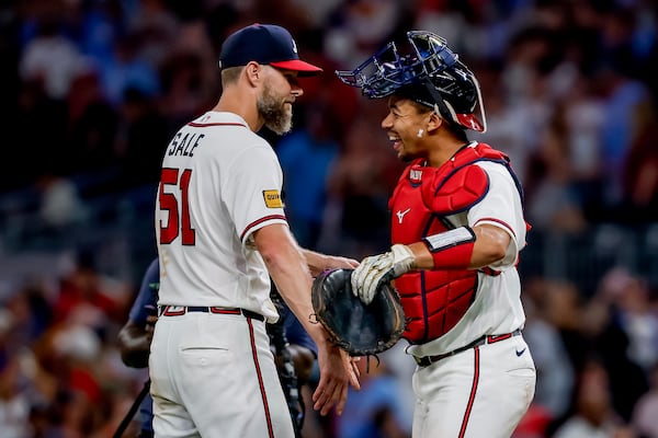 Braves pitcher Chris Sale (left) and catcher Drake Baldwin celebrate after a shutout win against the Dodgers on Thursday, Aug. 27, 2026, in Atlanta. (Erik S. Lesser/AP)