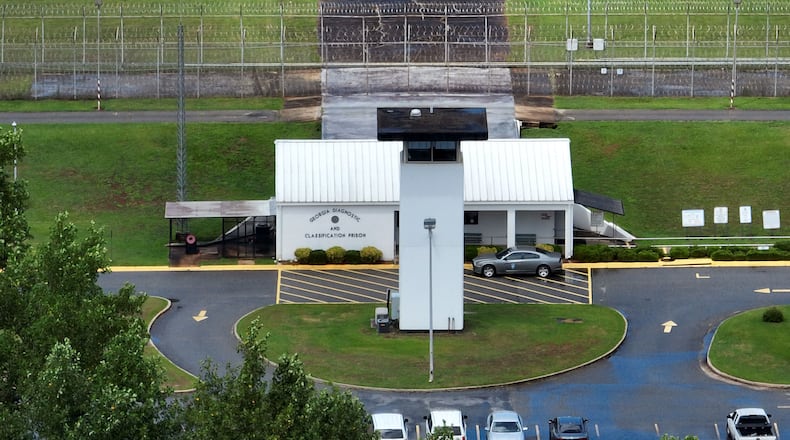 A social worker falsely accused of giving contraband to an incarcerated client during a visit at the state prison near Jackson has settled her malicious prosecution case against the Georgia Department of Corrections investigator who arrested her. Lily Engleman was paid $750,000 through the state's insurance coverage. (Hyosub Shin/Atlanta Journal Constitution/TNS)