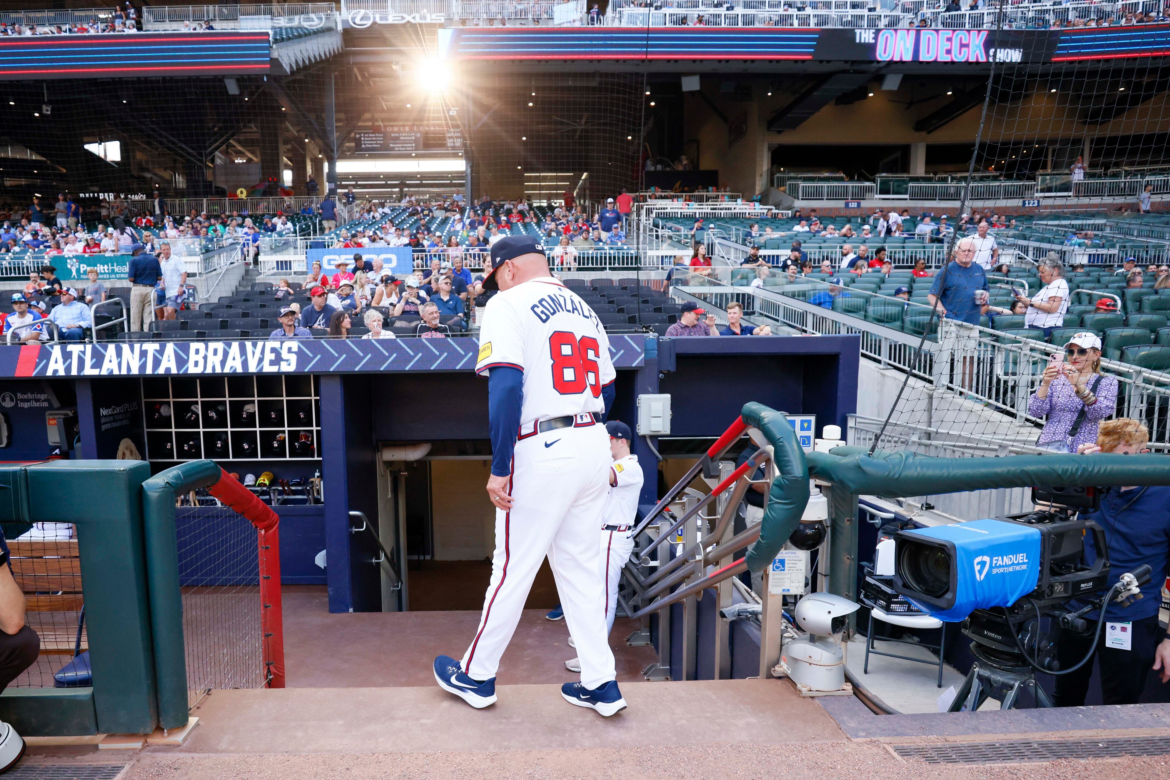 Atlanta Braves third base coach Fredi Gonzalez (86) enters the dugout before the game between the Atlanta Braves and the Arizona Diamondbacks at Truist Park on Tuesday, June 3, 2025, in Atlanta.
(Miguel Martinez/ AJC)