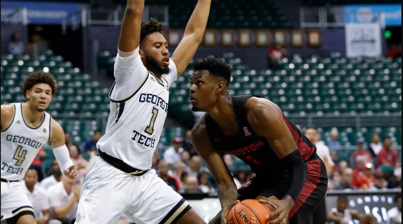 Georgia Tech's James Banks defends against Houston's Chris Harris during Monday's game. (AP photo)