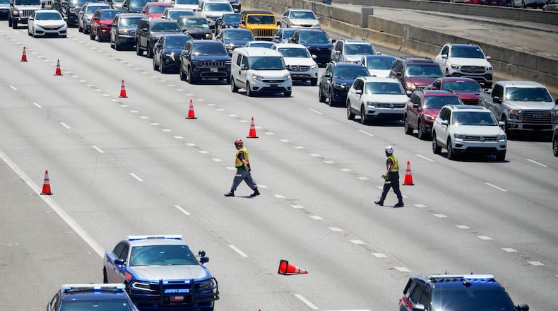 Multiple northbound lanes of the Downtown Connector at 14th Street were shut down due to a pedestrian fatality.