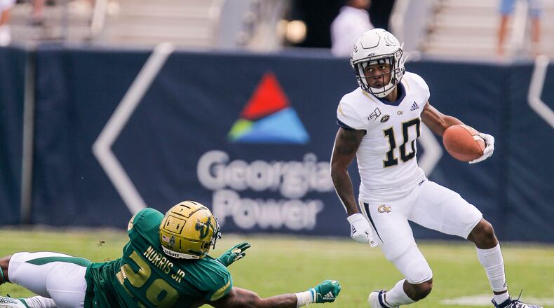 09/07/2019 -- Atlanta, Georgia -- Georgia Tech Yellow Jackets wide receiver Ahmarean Brown (10) returns a punt during the first half against the South Florida Bulls at Bobby Dodd Stadium in Atlanta, Saturday, September 7, 2019. (Alyssa Pointer/alyssa.pointer@ajc.com)