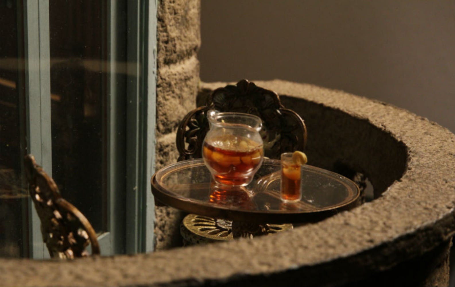 Astolat Dollhouse Castle iced tea on balcony