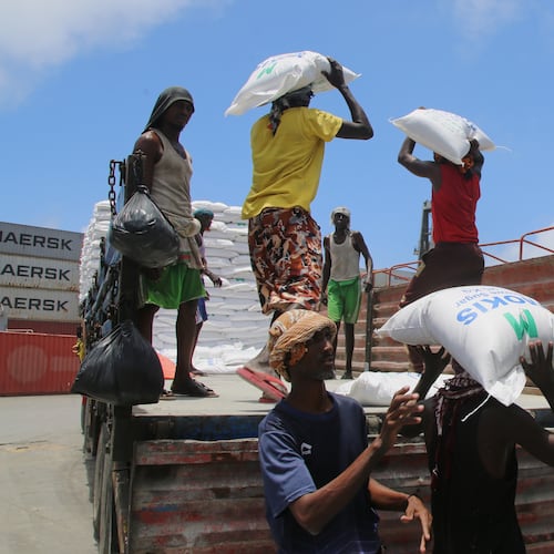 Workers load cargo at the port in Mogadishu, Somalia, Sunday, Sept. 13, 2026. (AP Photo/Farah Abdi Warsameh)