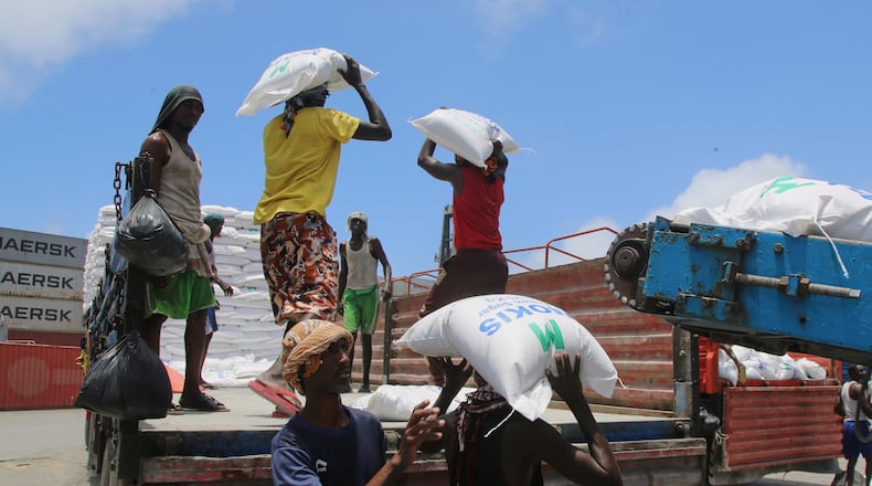 Workers load cargo at the port in Mogadishu, Somalia, Sunday, Sept. 13, 2026. (AP Photo/Farah Abdi Warsameh)
