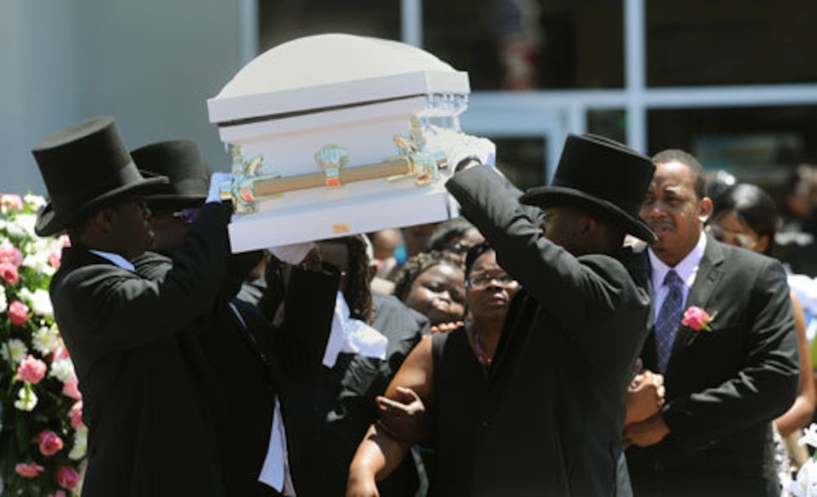 Mourners attend the funeral of Jazmin Green