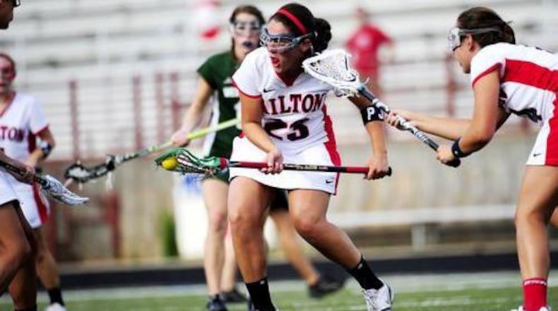 Girls lacrosse and youth baseball programs and camps will be offered at sites around Milton under agreements approved by the City Council. AJC FILE