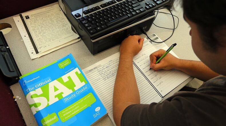 Despite the fact many colleges are not requiring SAT or ACT scores for admission next year, some students are still planning to take the college admissions exams. Is that a good idea? (Curtis Compton / ccompton@ajc.com)