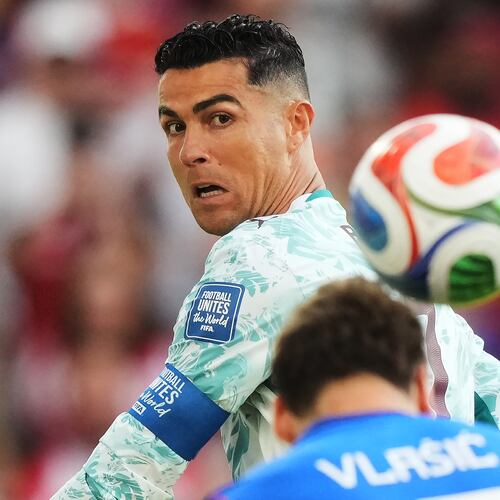 Portugal's Cristiano Ronaldo (7) watches as Croatia's Nikola Vlasic (13) heads the ball during the World Cup round of 32 soccer match between Portugal and Croatia in Toronto, Thursday, July 2, 2026. (Nathan Denette/The Canadian Press via AP)