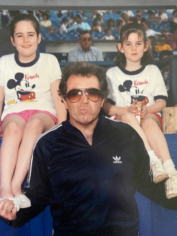 Beau Bock with his daughters Page and Grace in 1989 at Atlanta Fulton-County Stadium. (Courtesy of the Bock family)