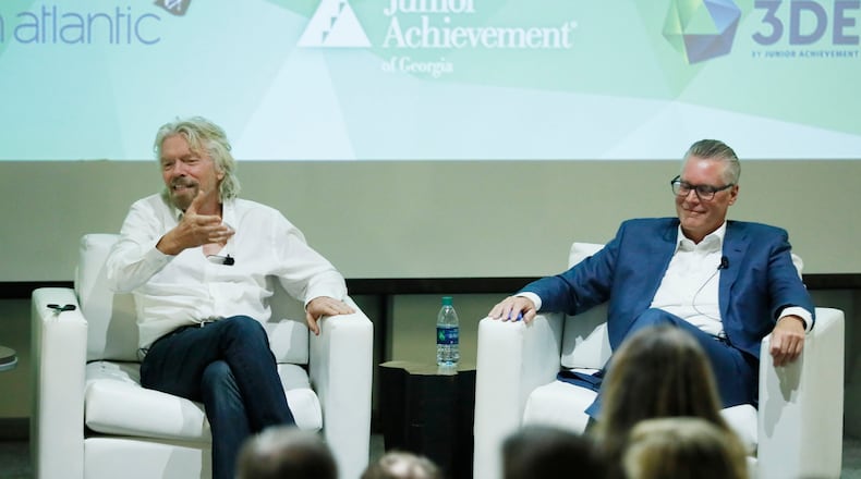 Delta CEO Ed Bastian and Virgin founder Richard Branson held a "fireside chat" event in Atlanta. BOB ANDRES  /BANDRES@AJC.COM